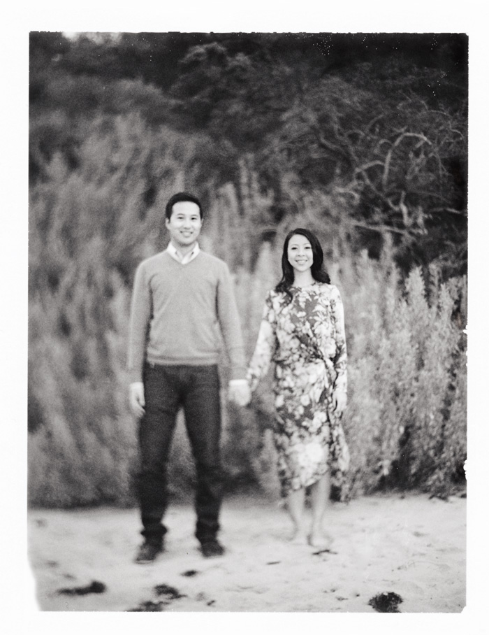 polaroid black and white engagement photography on the beach