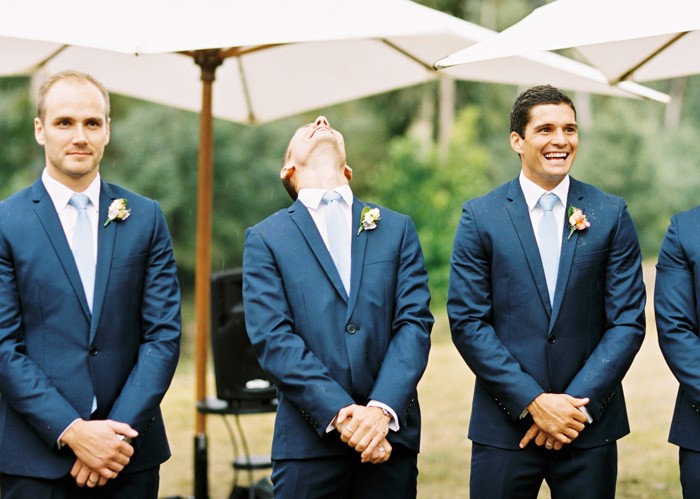 grooms reaction to his bride when he sees her as she walks down the wedding aisle 