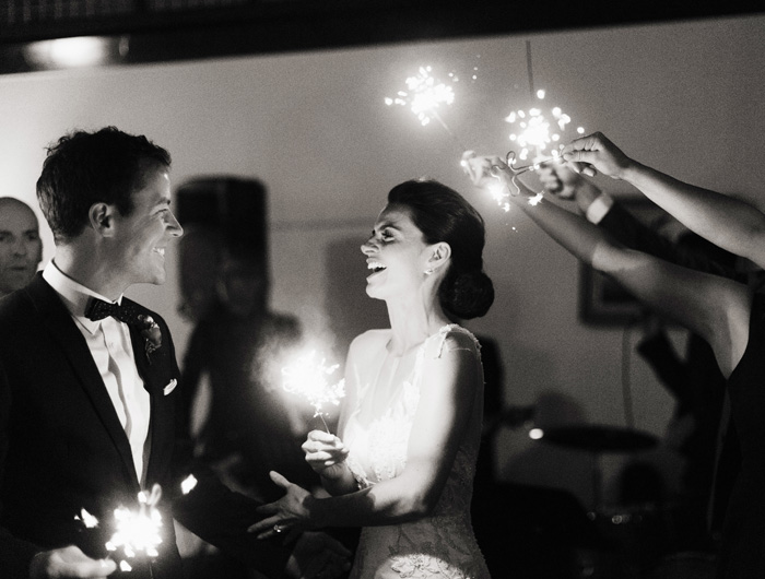 bride and groom with wedding sparklers 