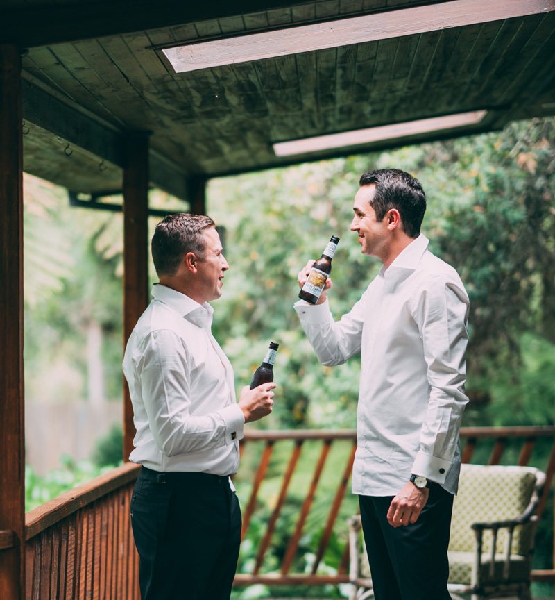 Groom getting ready and drinking beers