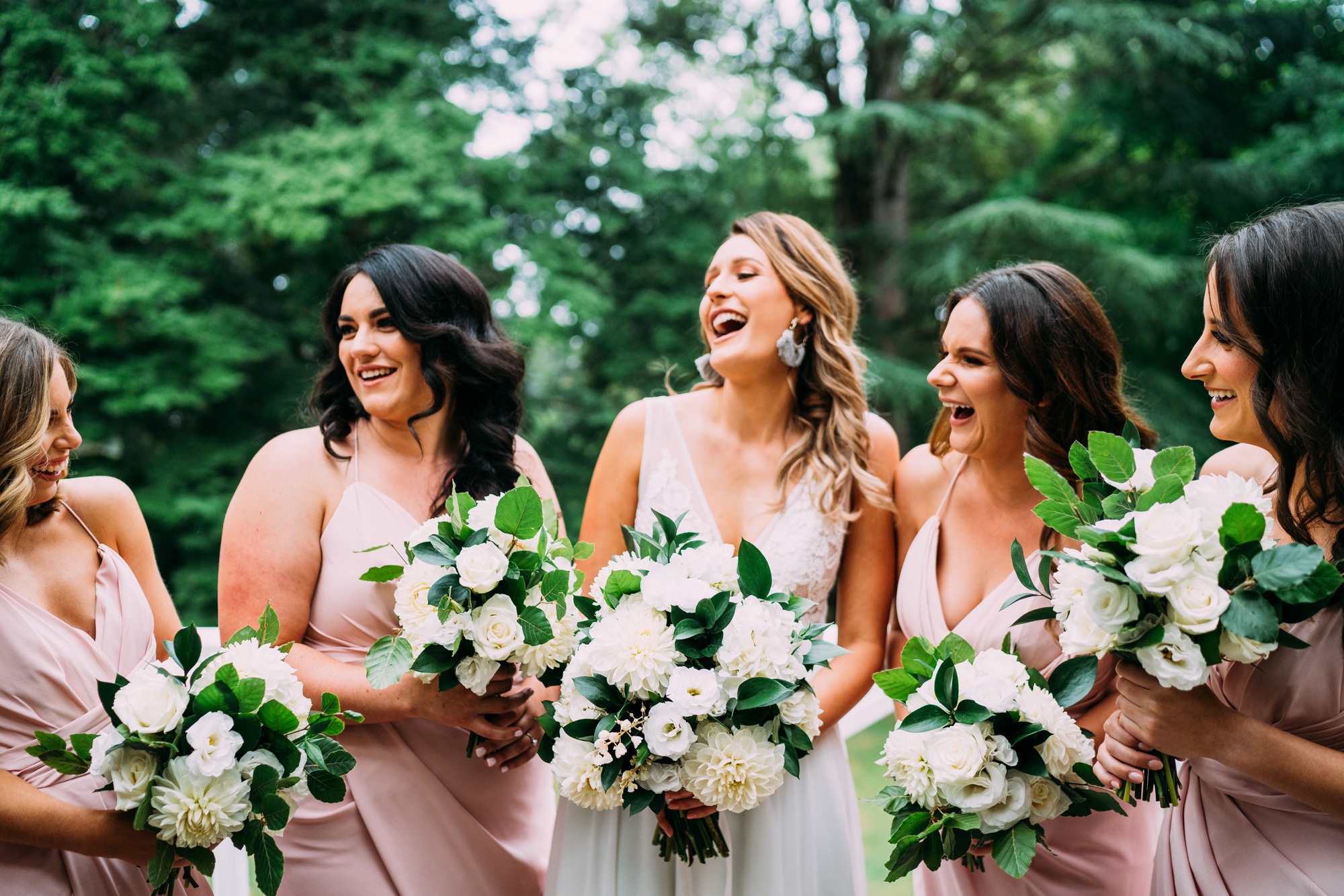 bridal party having so much fun and laughing