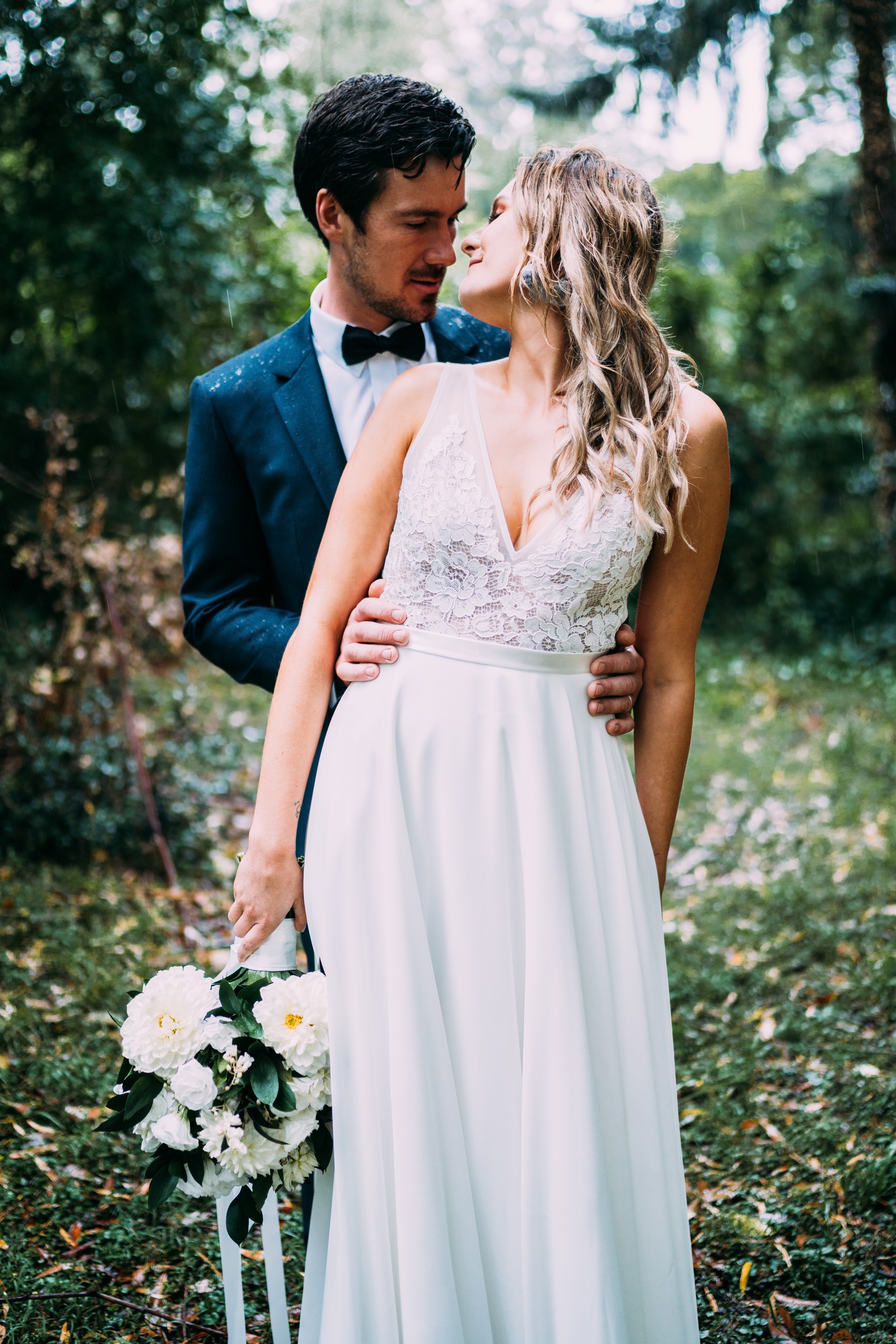 romantic couple on their wedding day kissing